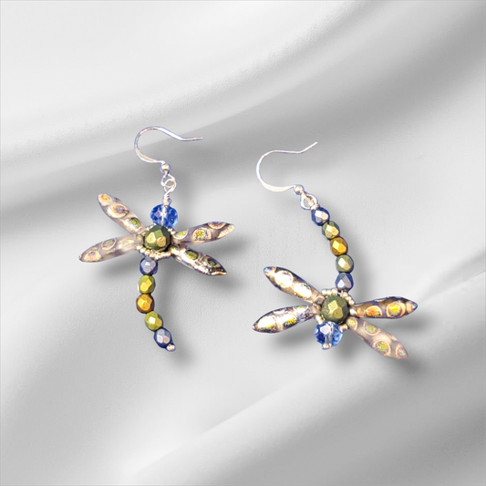 a pair of dragonfly earrings with multicolored beads